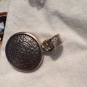 Silver Round Pendant of Aztec calendar. Vintage. 1990s. 1/2 inch.